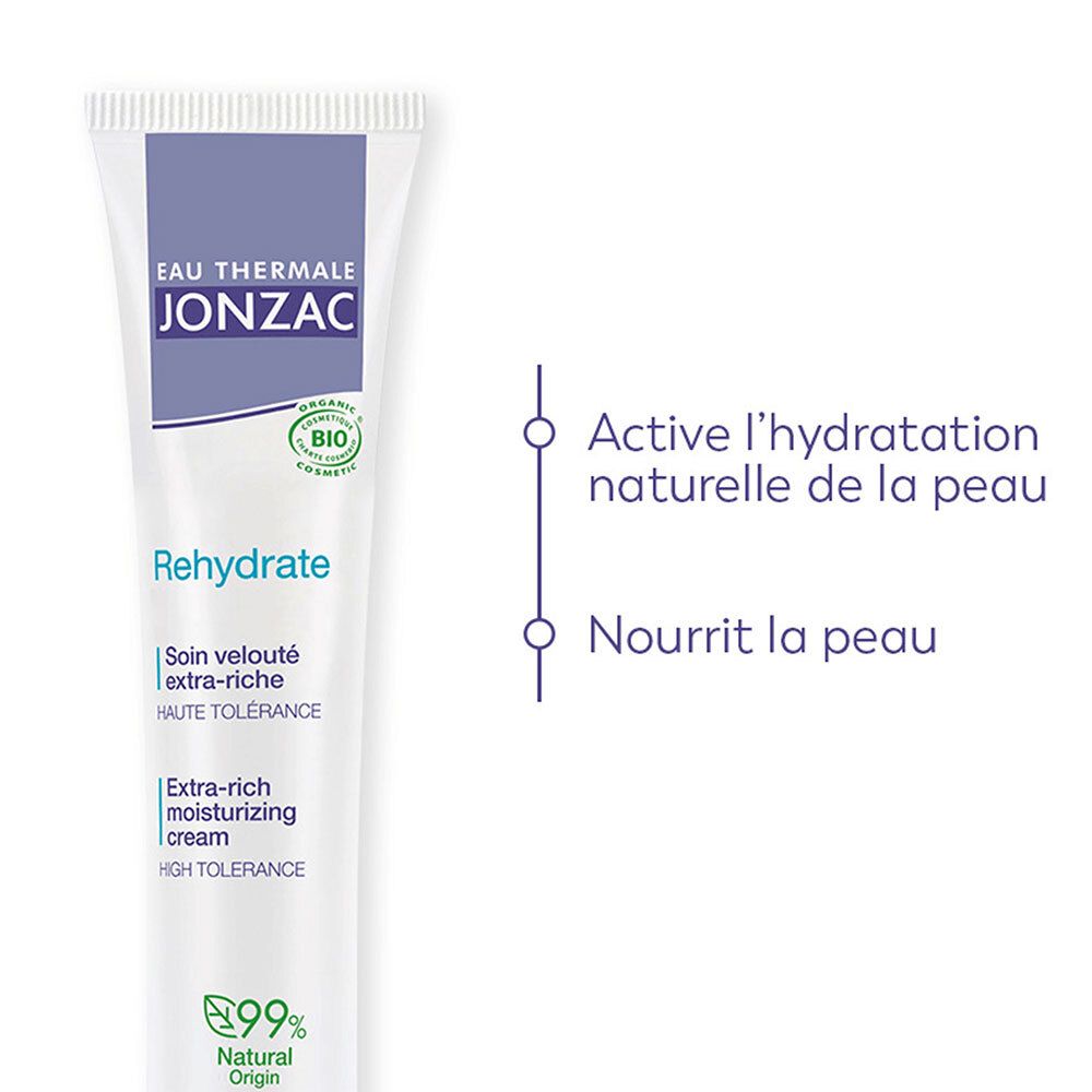 Weiße Tube mit lila Deckel. Text: Eau Thermale Jonzac, Rehydrate. Zwei vertikale Linien mit Text: Hydratation, Ernährung.