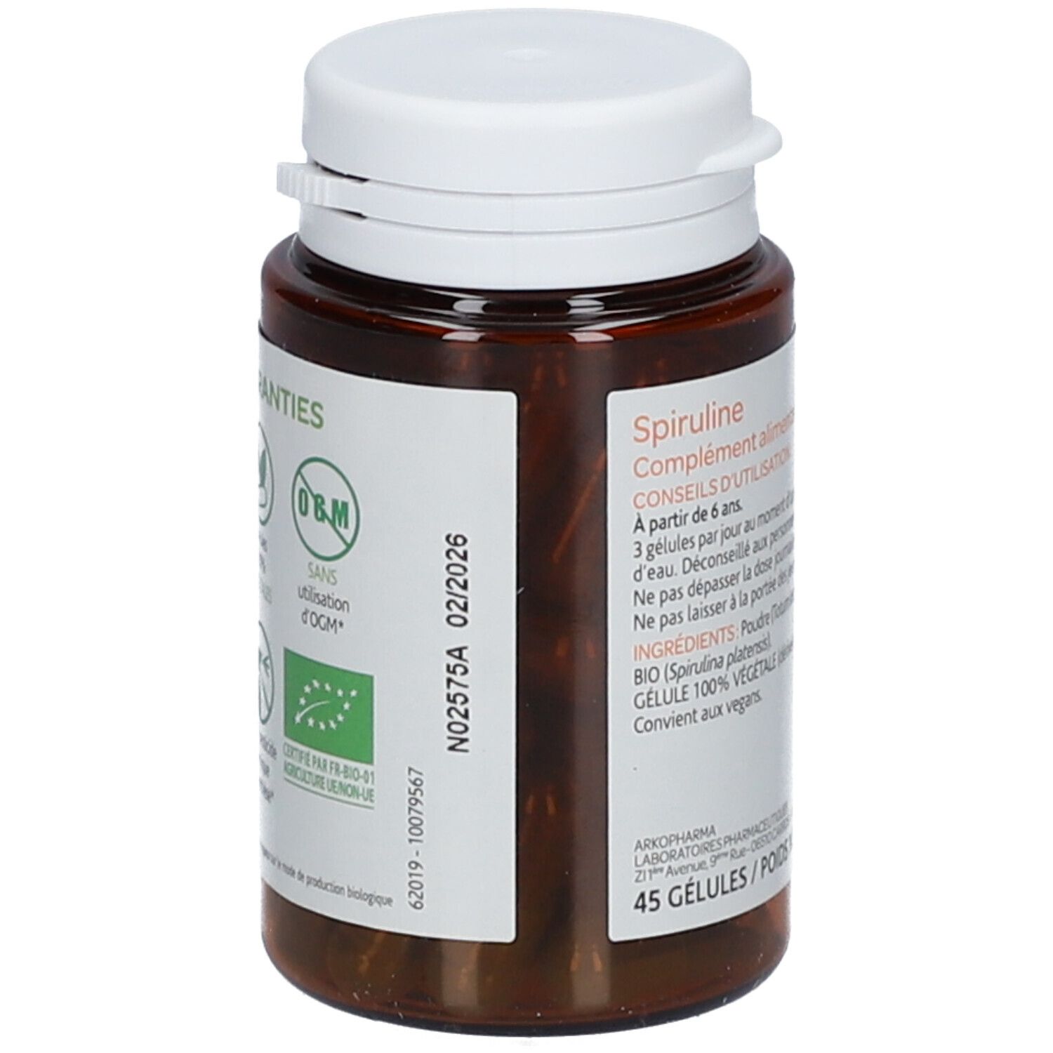 Flacon avec bouchon blanc. Étiquette: Spiruline, complément alimentaire. Date de péremption 02/2026.