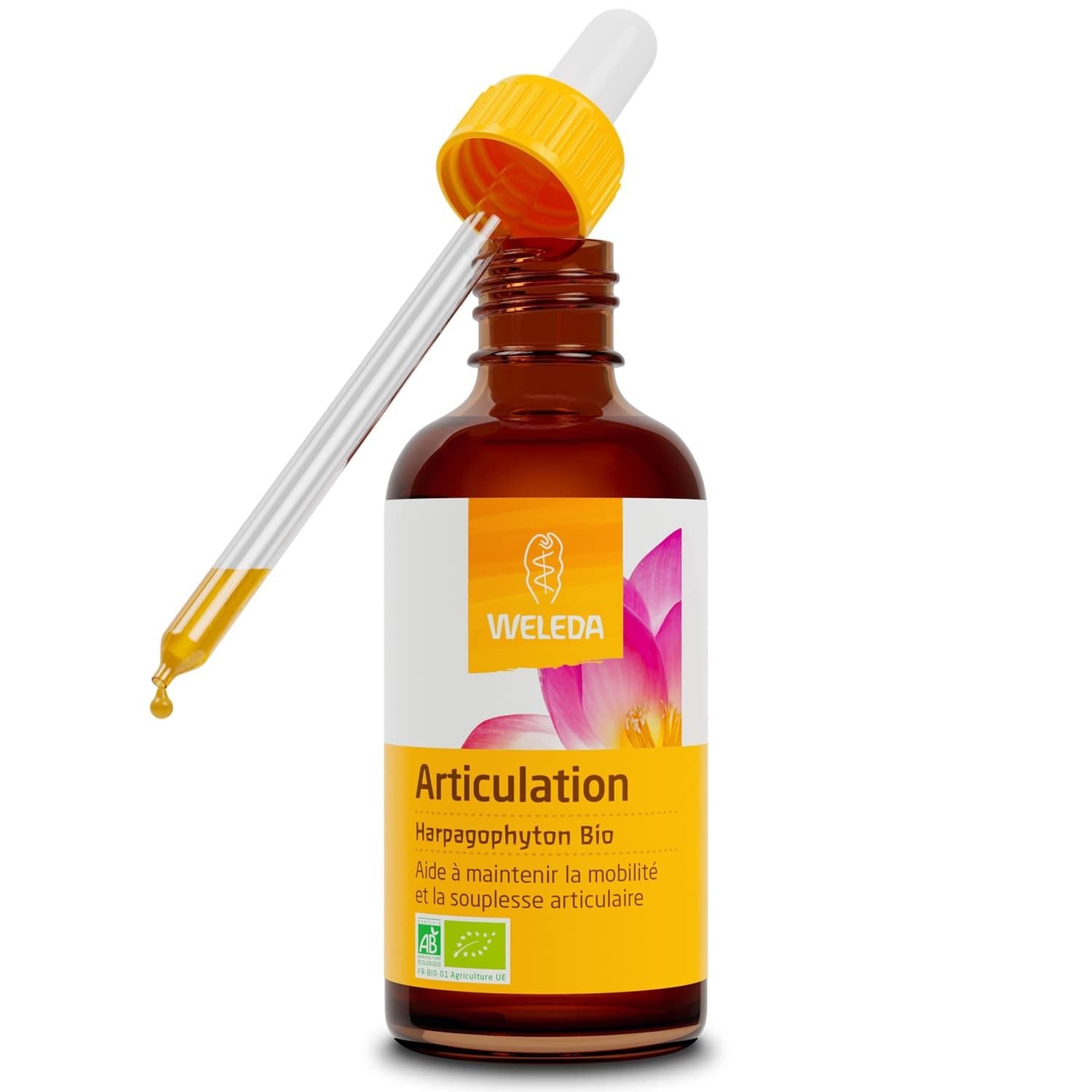 Flacon en verre brun avec étiquette jaune. WELEDA Articulation Harpagophyton Bio. Pipette insérée.