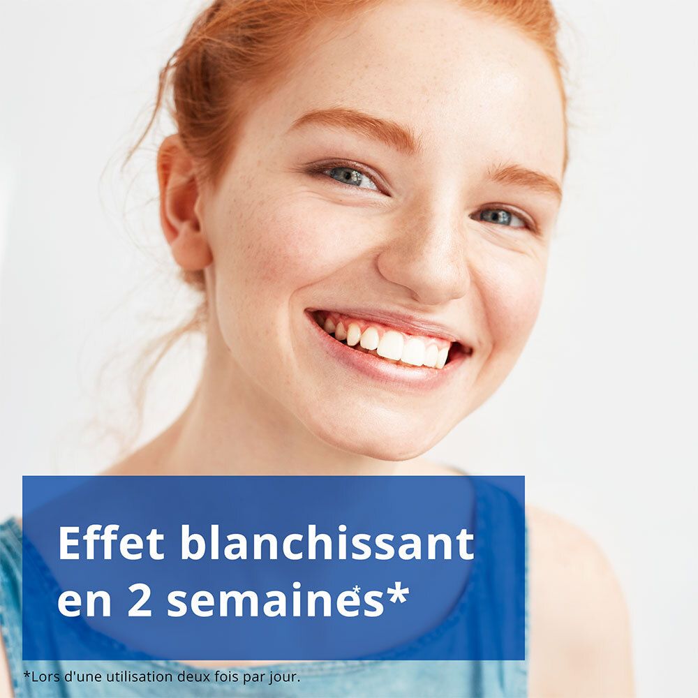 Femme souriante. Texte : Effet blanchissant en 2 semaines.