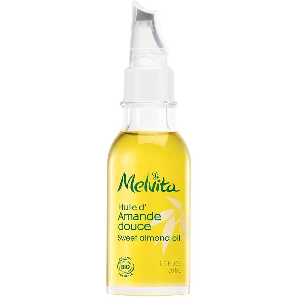Melvita Bio-Mandelöl. Glasflasche mit gelbem Öl und Dosierer. Aufschrift: Huile d'Amande douce, Sweet almond oil.