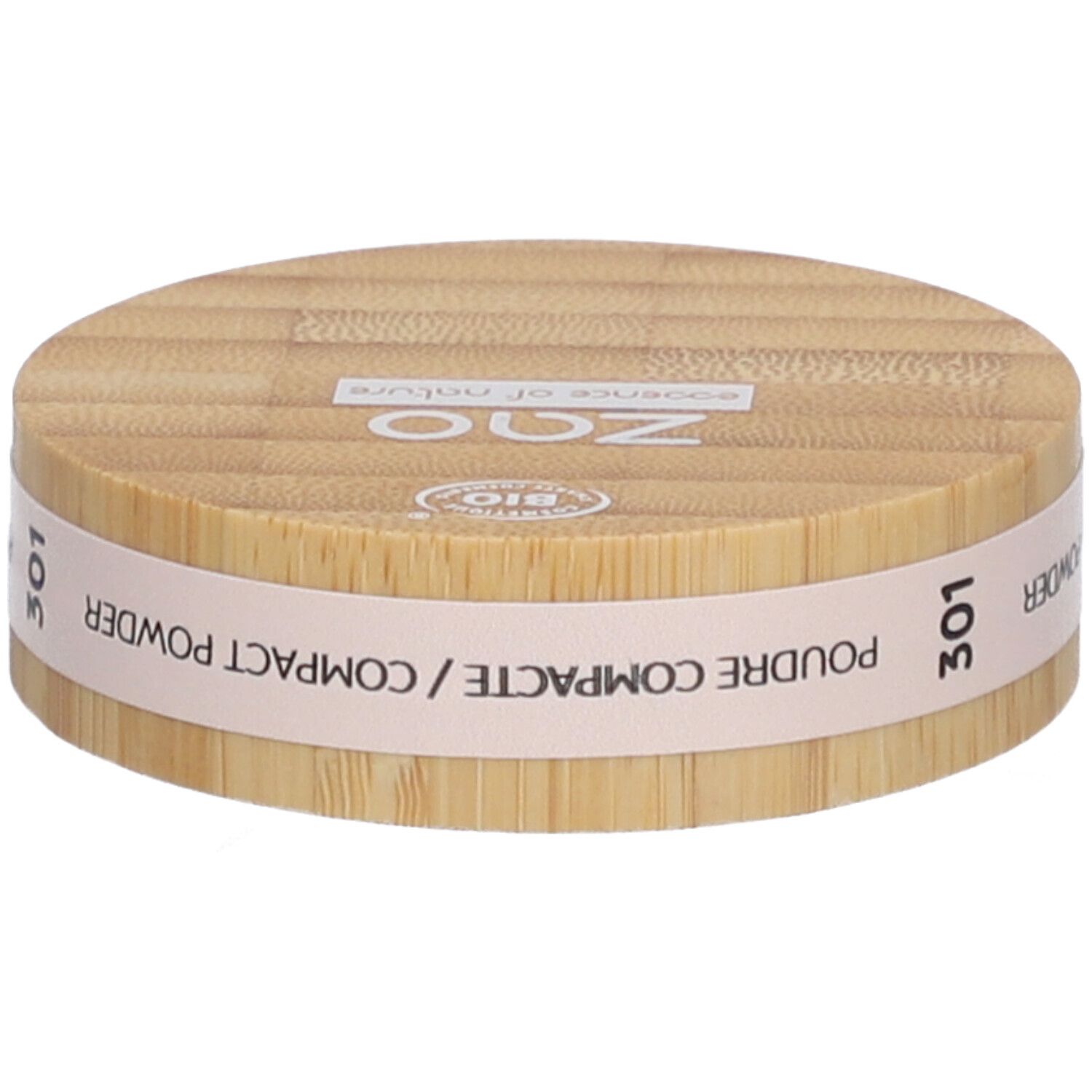 Compact poederverpakking van hout. Opschrift: ZAO, 301, Poudre Compacte/Compact Powder. Bio-keurmerk.