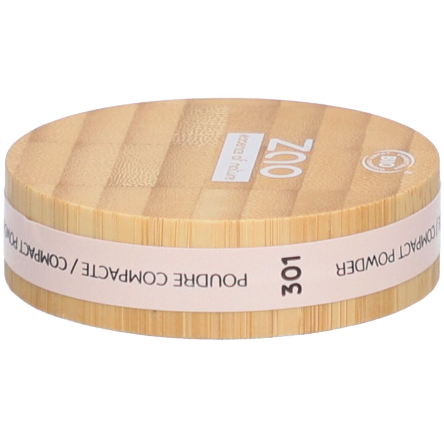 Compact poederverpakking van hout. Opschrift: ZAO, 301, Poudre Compacte/Compact Powder. Bio-keurmerk.