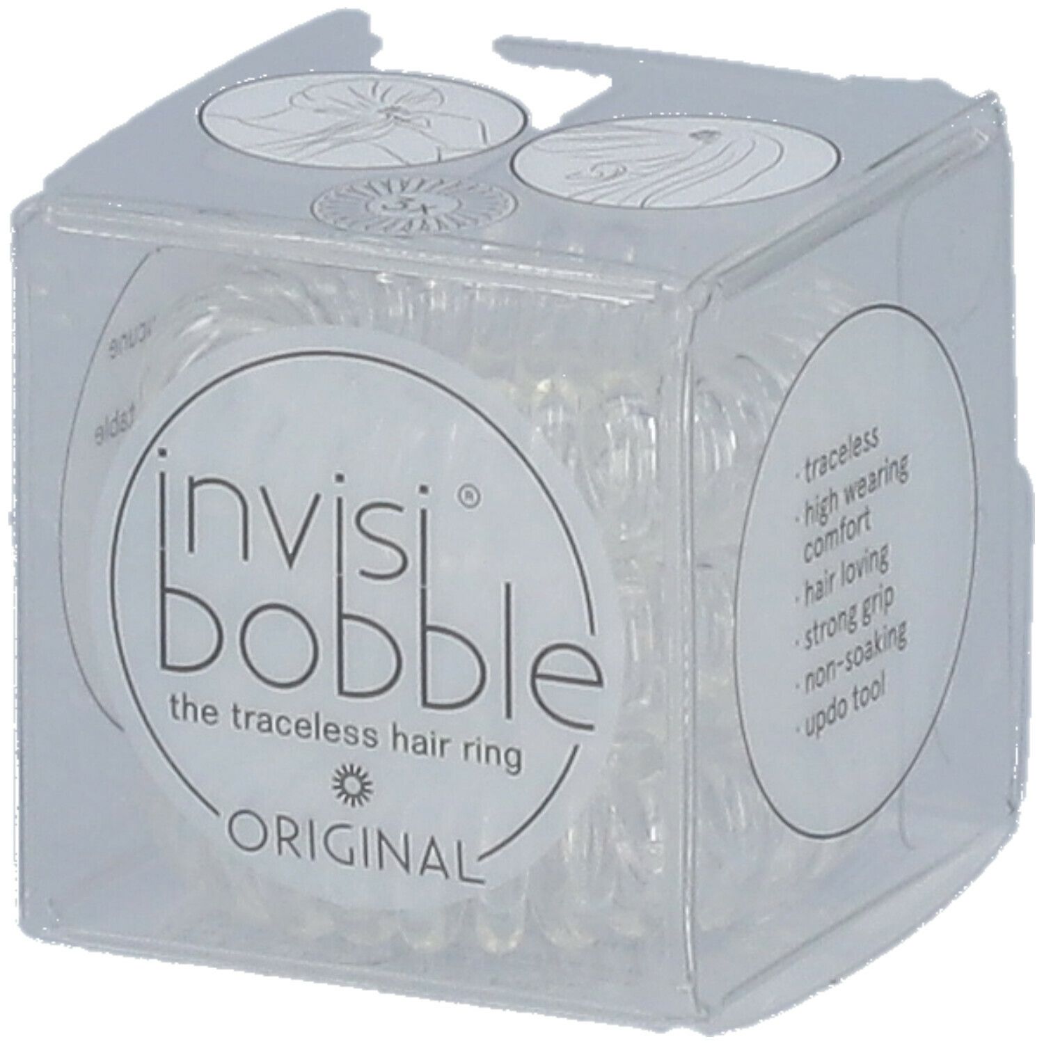 Klare, spiralförmige Haargummis in einer transparenten Würfelverpackung. Auf der Verpackung steht "invisibobble® ORIGINAL".