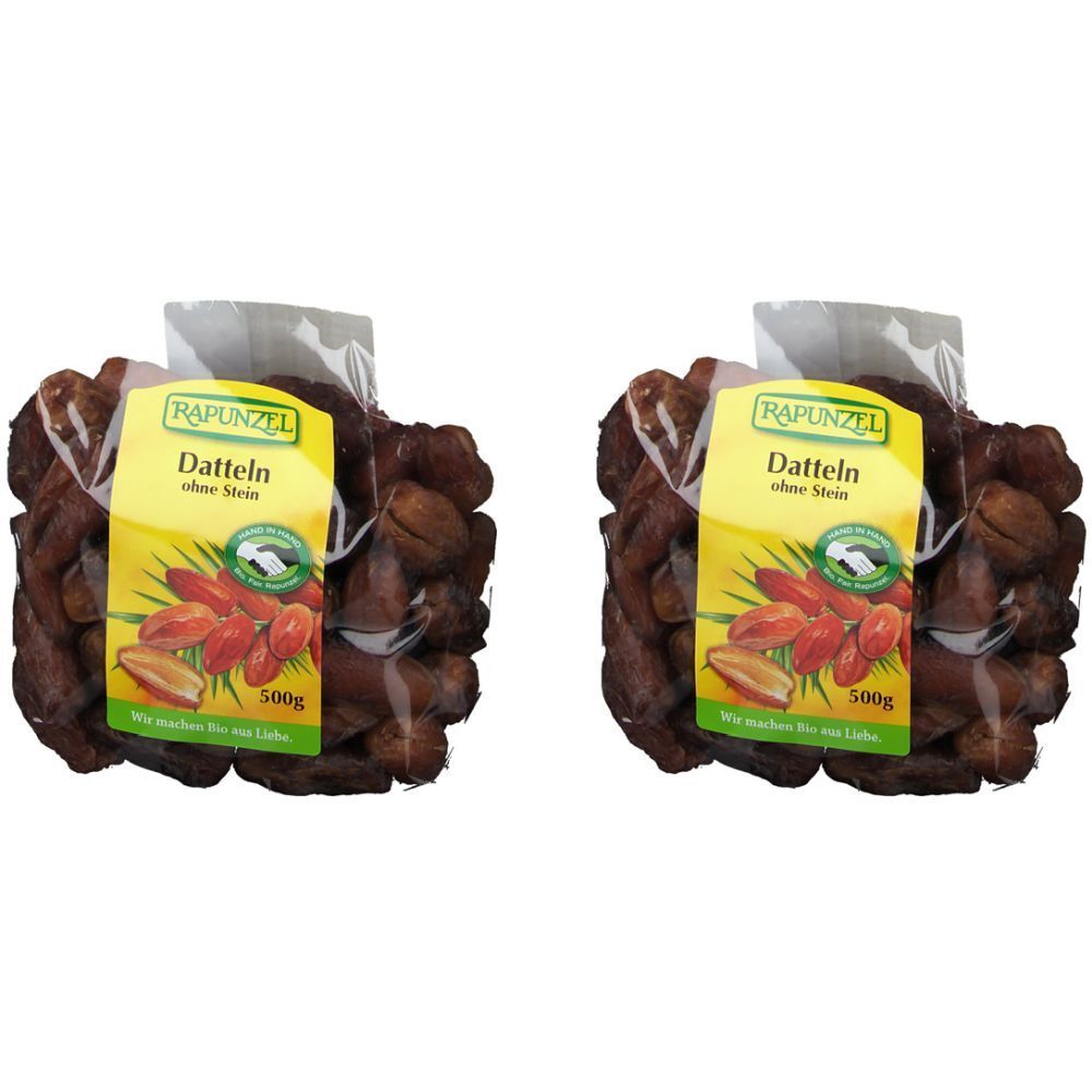 Zwei Packungen Datteln ohne Stein. Gelbe Etiketten mit Produktnamen und Logo. 500g.