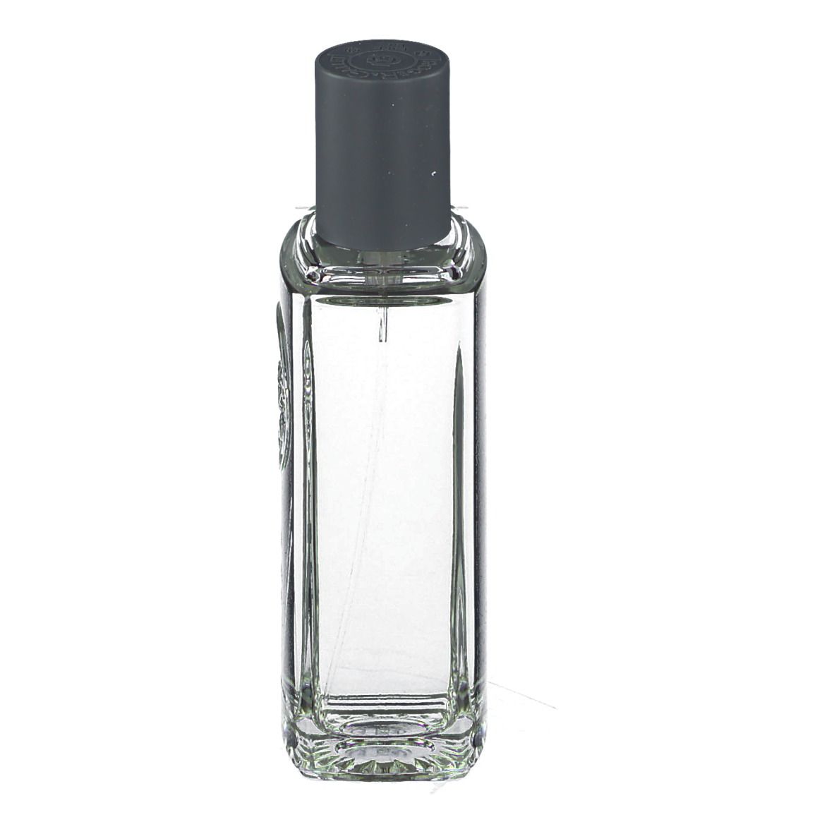 Flacon transparent avec bouchon gris. Vaporisateur visible. Étiquette avec logo et texte.