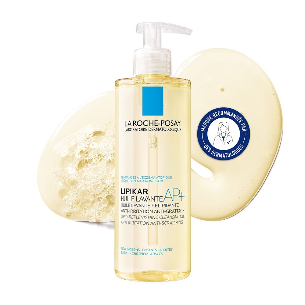 La Roche-Posay Lipikar Dusch- und Badeöl AP+. Flasche mit Pumpe und Produkt-Text. Gelbe Flüssigkeit und Kleckse.