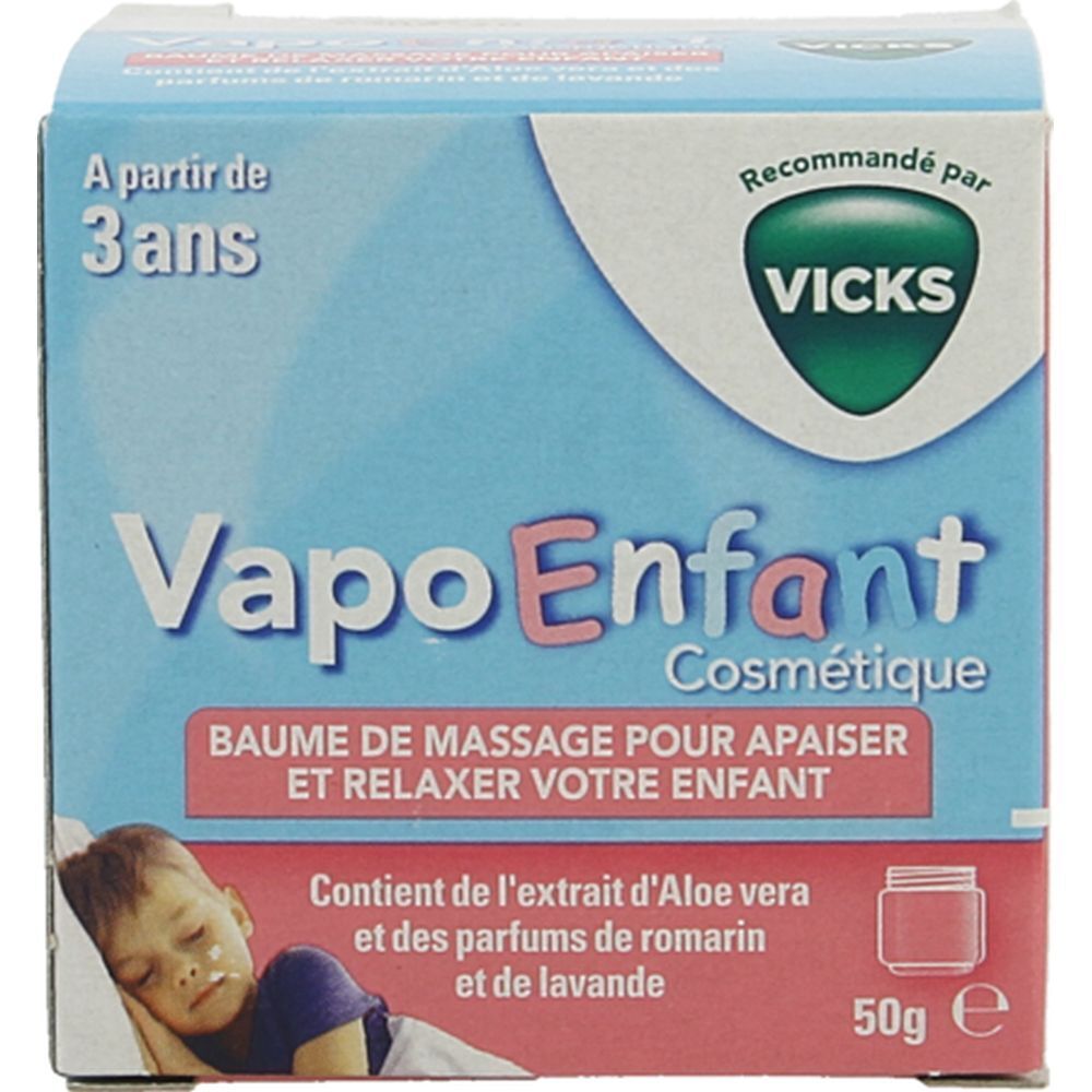 Boîte bleu clair. Inscription: VapoEnfant, Baume de massage. Recommandé par Vicks. 50g. Enfant dort.