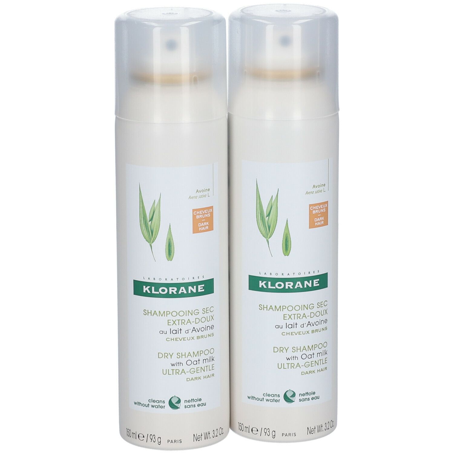 Deux flacons de shampooing sec à l'avoine. Flacons blancs avec vaporisateur et étiquette. Inscription : KLORANE, Dry Shampoo.