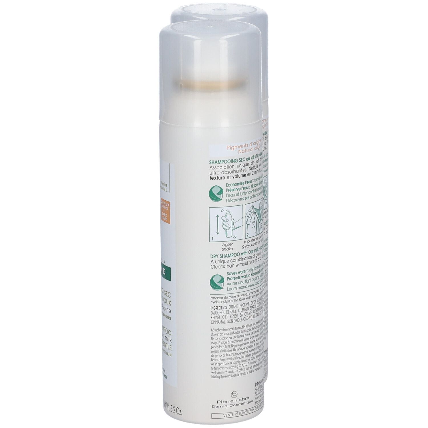 Un flacon de shampooing sec à l'avoine. Flacon blanc avec vaporisateur et étiquette. Inscription : KLORANE, Dry Shampoo.