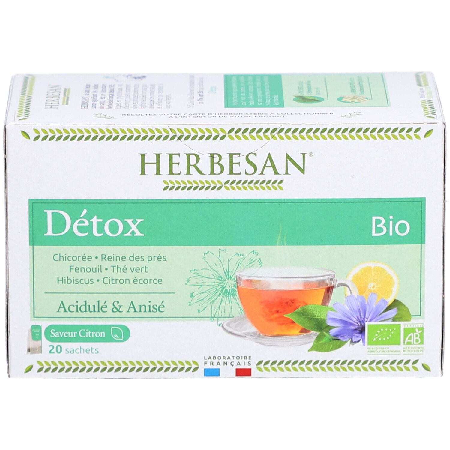 Schachtel Herbesan Bio Detox Tee. Vorderseite mit Tasse Tee, Zitrone und Blume. 20 Beutel. Bio-Zertifizierung.