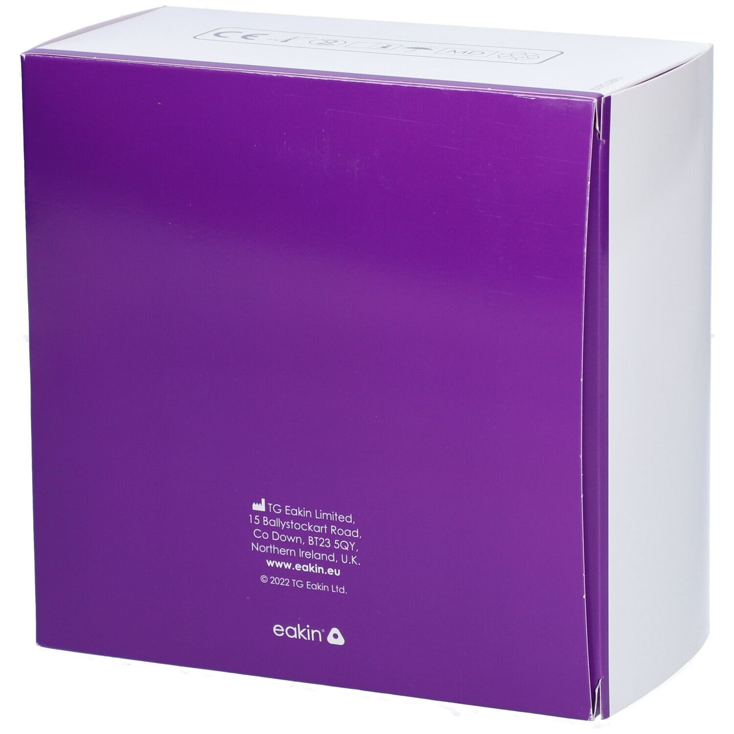 Dos d'une boîte blanche avec couvercle violet. Texte: TG Eakin Limited, adresse, site web et informations de copyright.