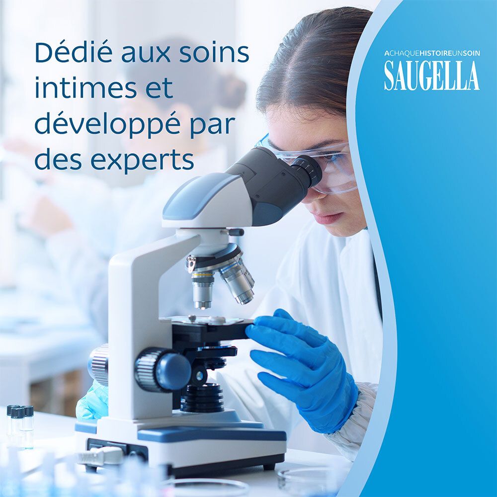 Femme avec microscope. Texte: Dédié aux soins intimes et développé par des experts. Logo SAUGELLA.