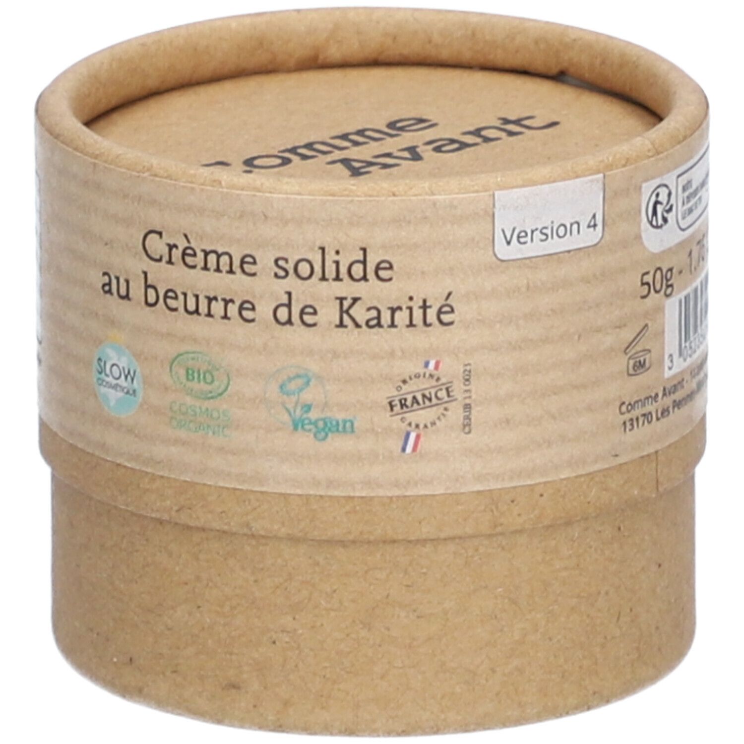Emballage cylindrique. Inscription: Comme Avant, Crème solide au beurre de Karité. Contenu: 50g. Logos: Slow Cosmétique, Bio Cosmos Organic, Vegan, France.
