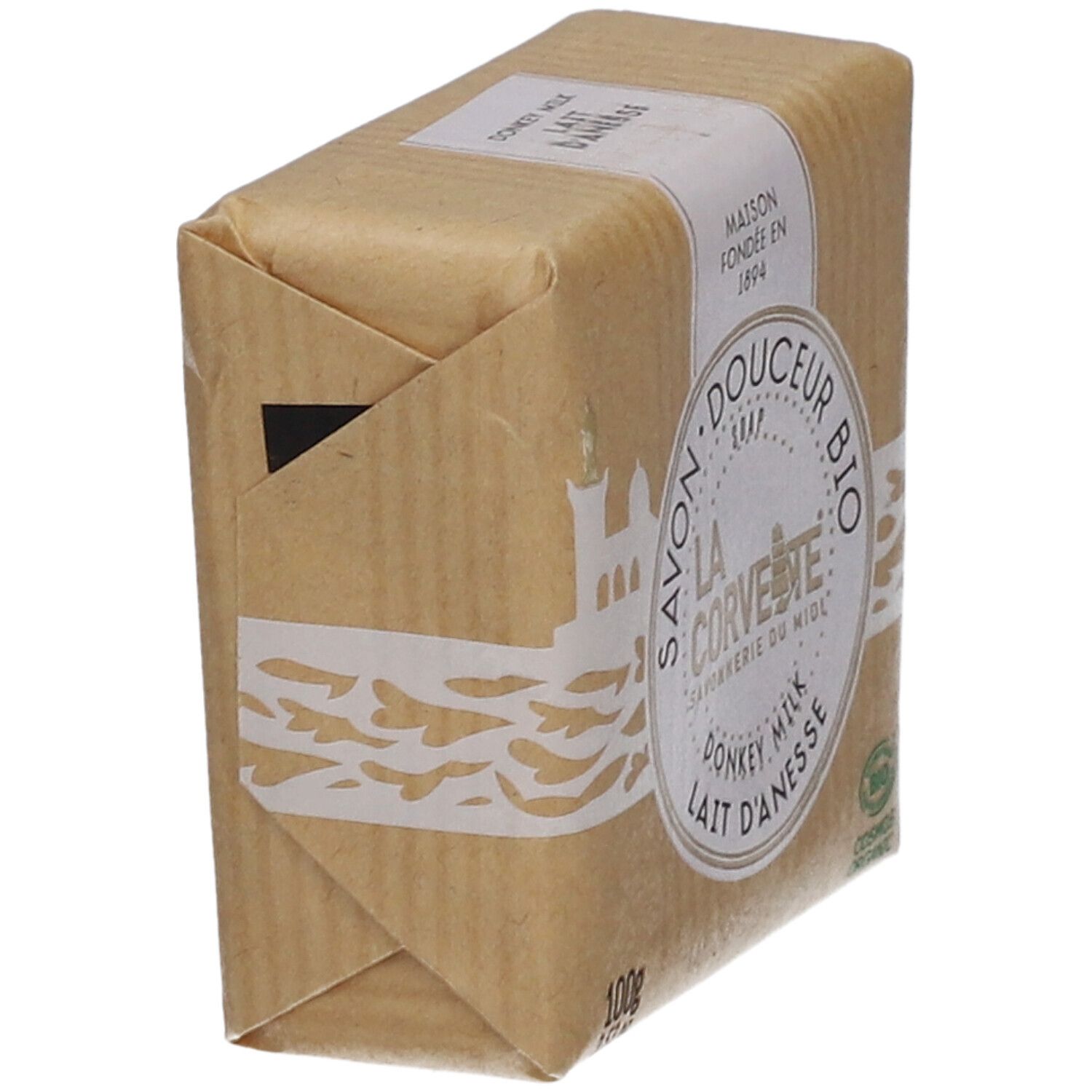 Savon emballé dans du papier. Inscription: LA CORVETTE, BIO, Donkey Milk, Lait d'Anesse. Emballage en biais.