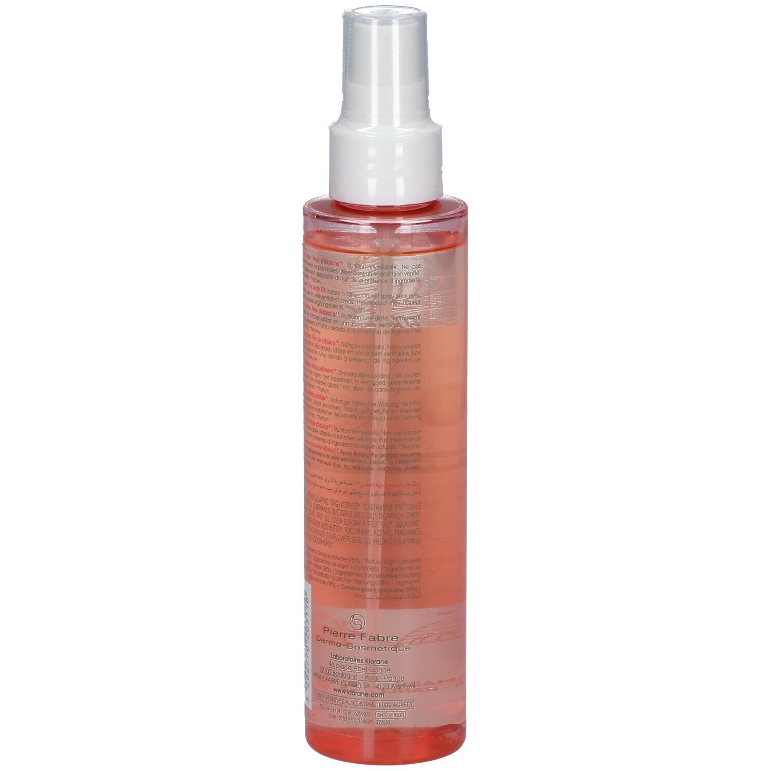 Vue arrière d'un flacon spray transparent avec tête blanche. Texte sur l'étiquette. Liquide rose visible.