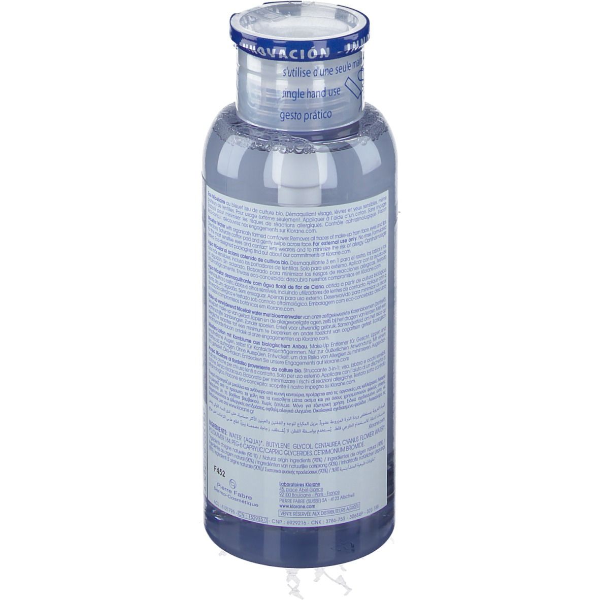 Flacon transparent avec liquide bleu. Étiquette avec texte. Bouchon avec bande bleue et inscription.