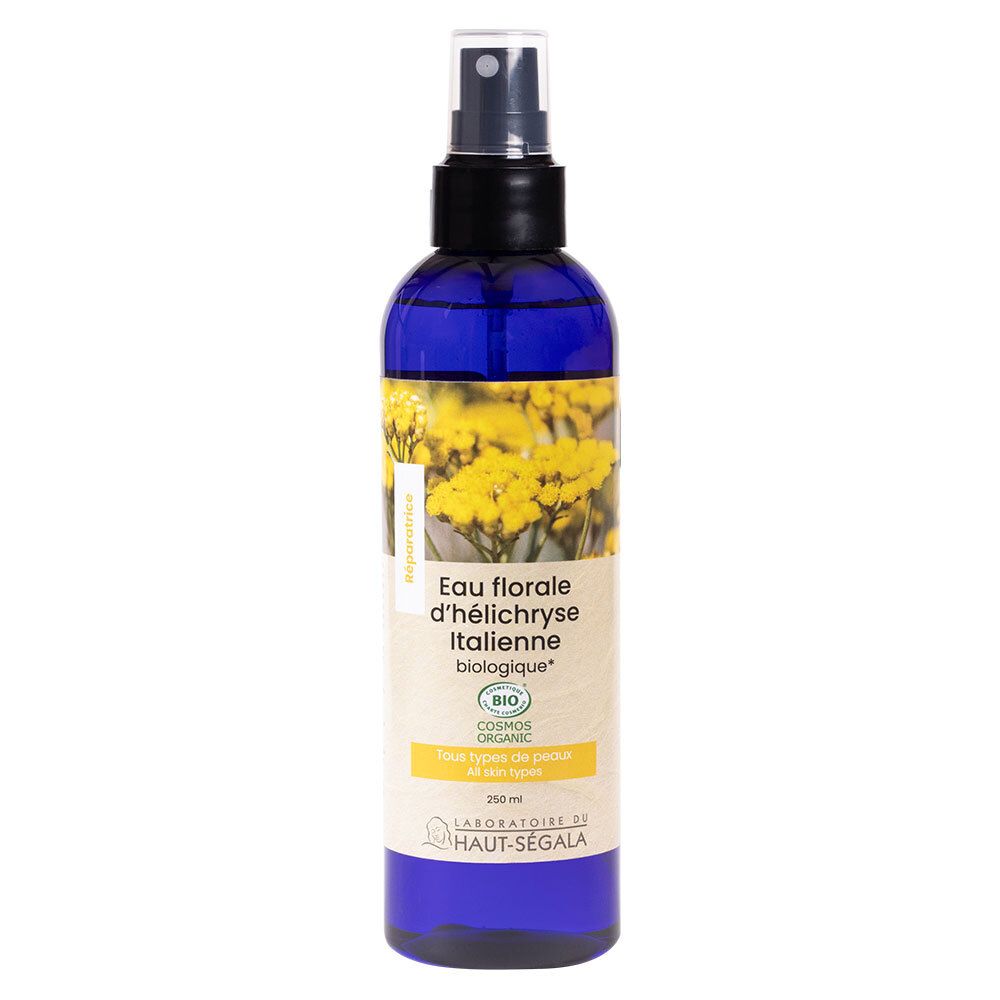 Flacon bleu avec vaporisateur. Étiquette avec texte : Eau florale d'h

lélichryse Italienne biologique. Certification bio.