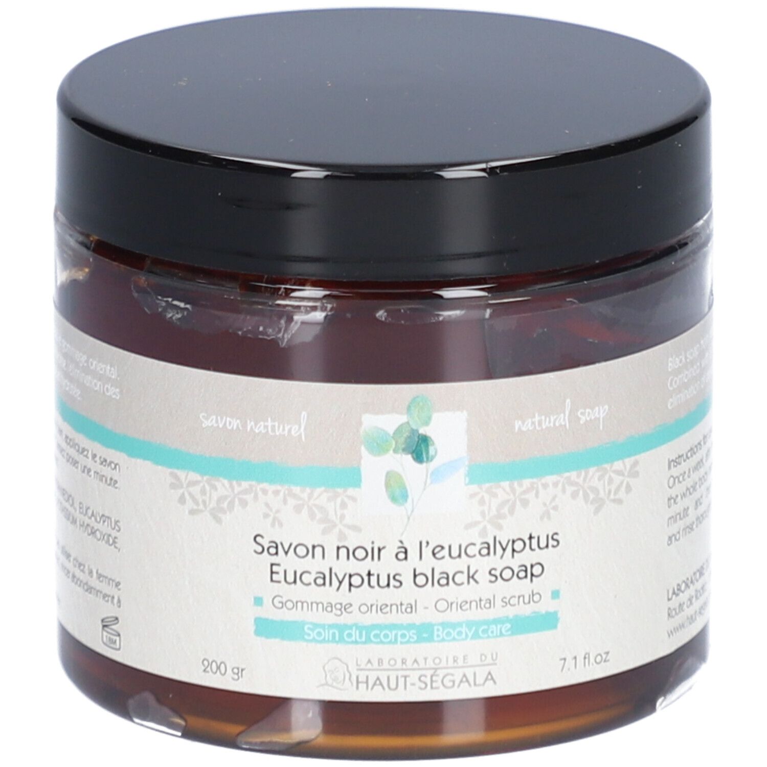 Pot en verre brun avec couvercle noir. Inscription: Savon noir à l'eucalyptus, Eucalyptus black soap, Gommage oriental, Soin du corps.