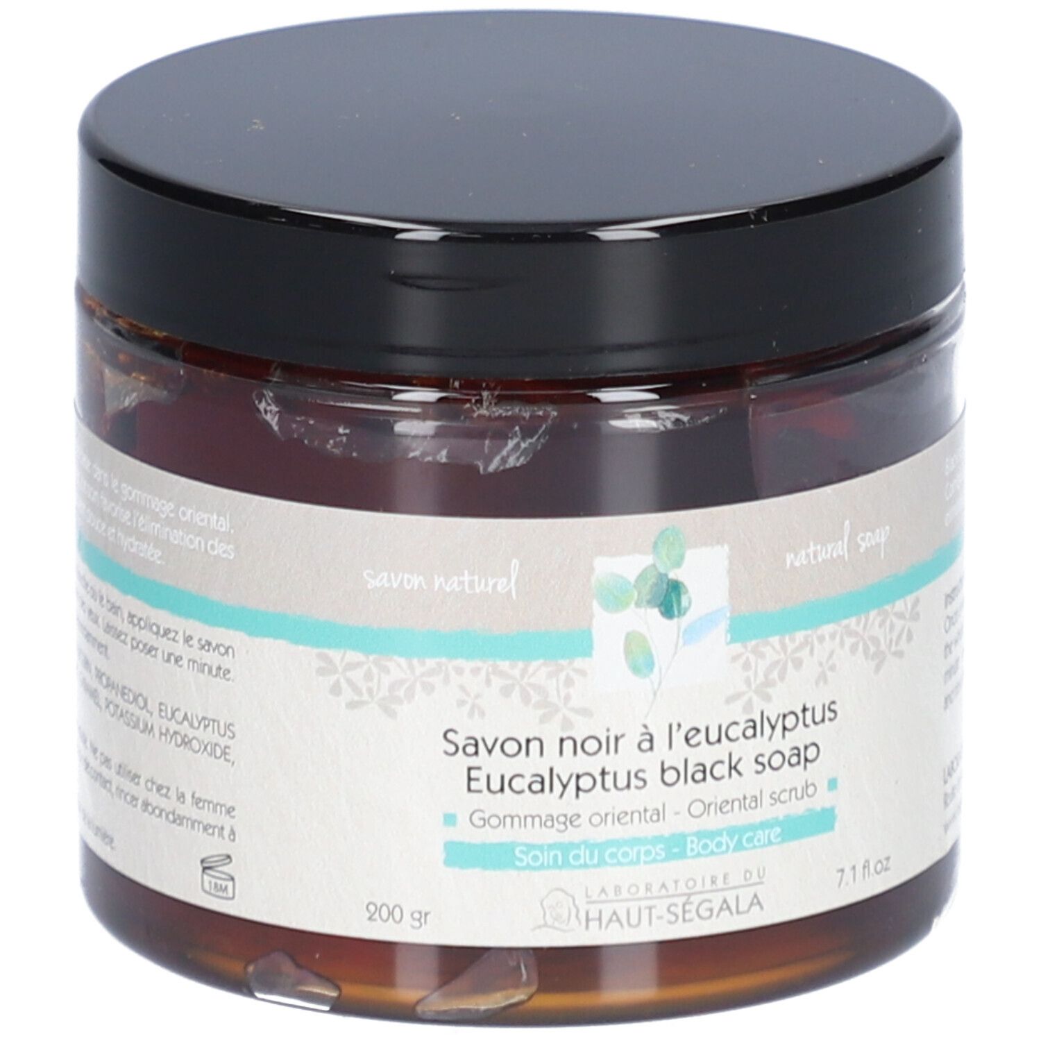 Pot en verre brun avec couvercle noir. Inscription: Savon noir à l'eucalyptus, Eucalyptus black soap, Gommage oriental, Soin du corps.