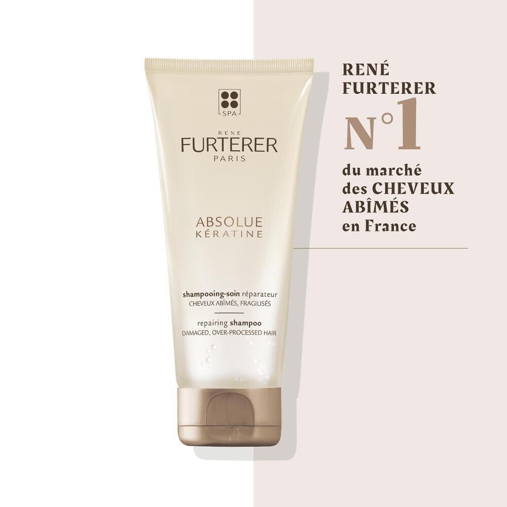 Beige Tube. Aufschrift: RENE FURTERER, ABSOLUE KERATINE. Text in Französisch und Englisch. Goldfarbener Verschluss. Nr. 1 in Frankreich.