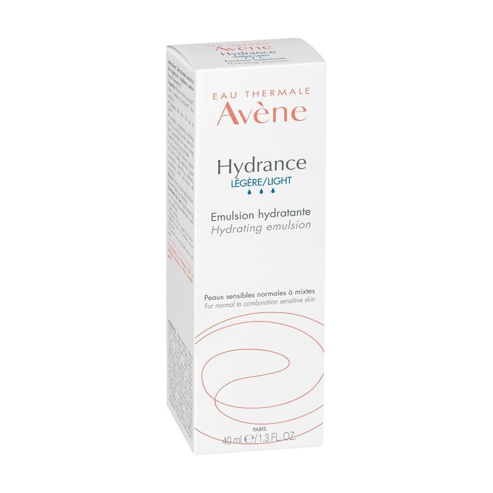Weiße Schachtel mit Avene Hydrance, leichte Feuchtigkeitsemulsion. Text und Logo in Orange und Blau. Auf weißem Hintergrund.