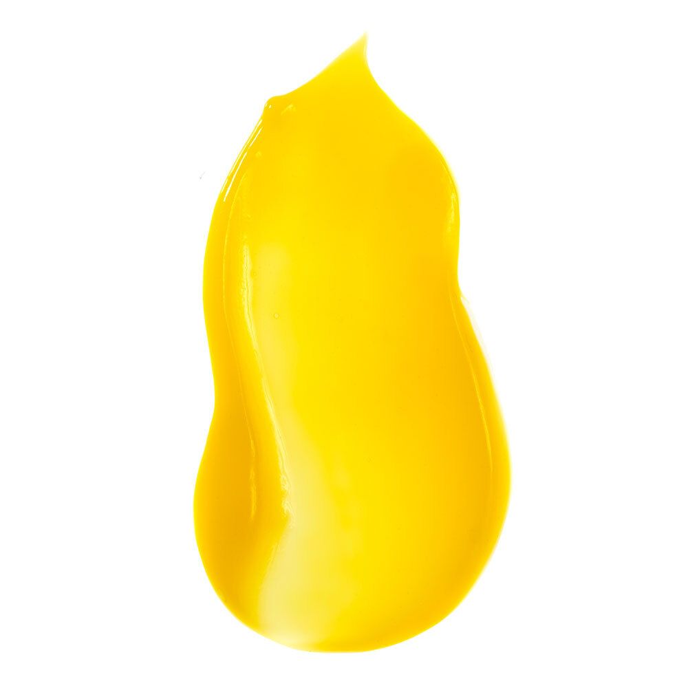 Échantillon de produit jaune sur fond blanc. En forme de goutte.