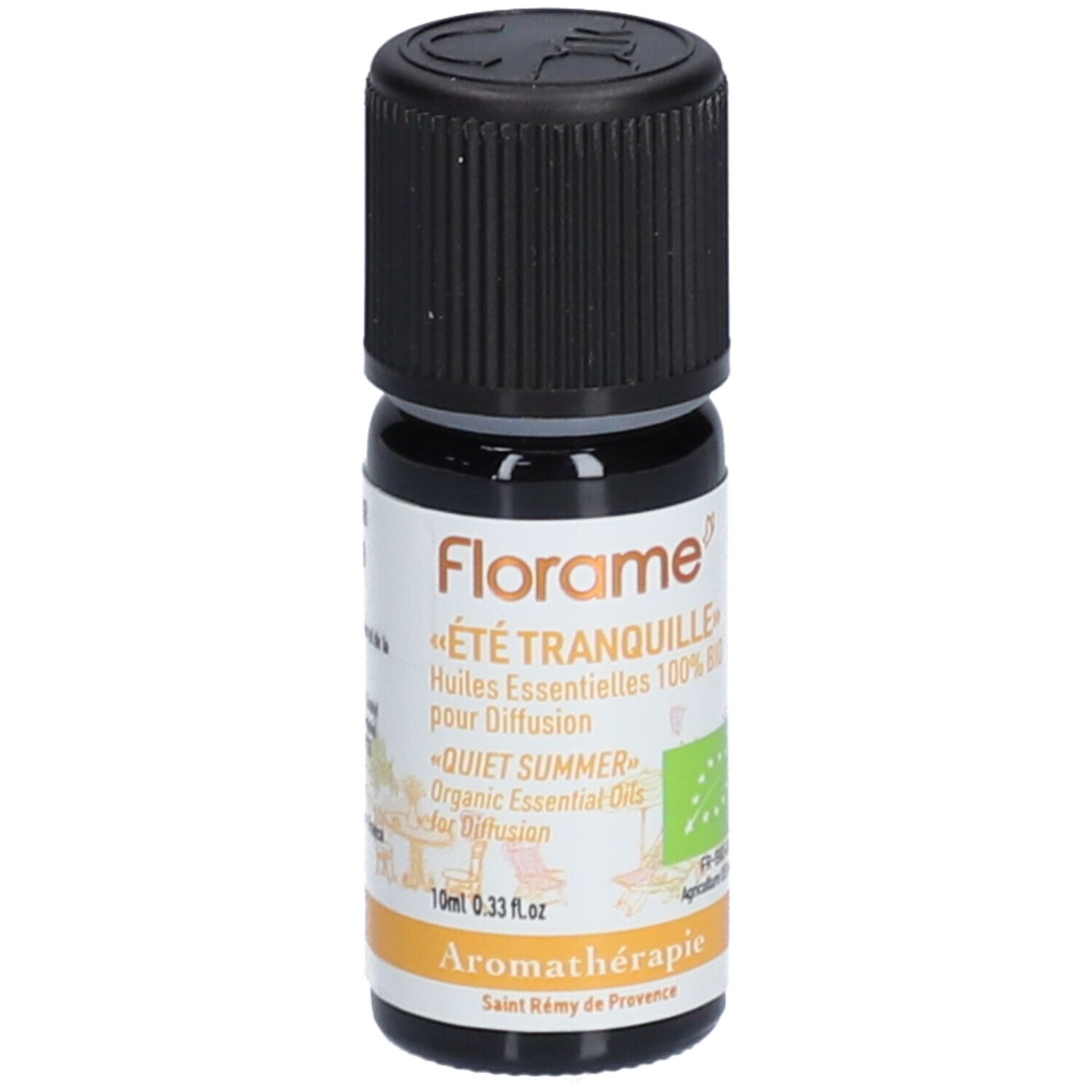 Flacon en verre brun avec bouchon noir. Étiquette avec texte «ÉTÉ TRANQUILLE» et «QUIET SUMMER». Label bio.