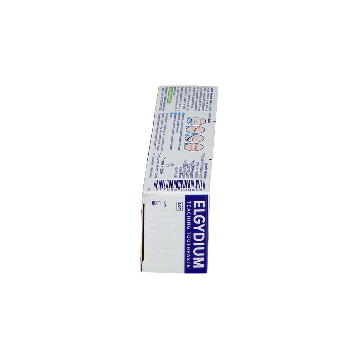 Boîte de dentifrice, vue latérale. Texte: ELGYDIUM, Teaching Toothpaste. Informations produit.