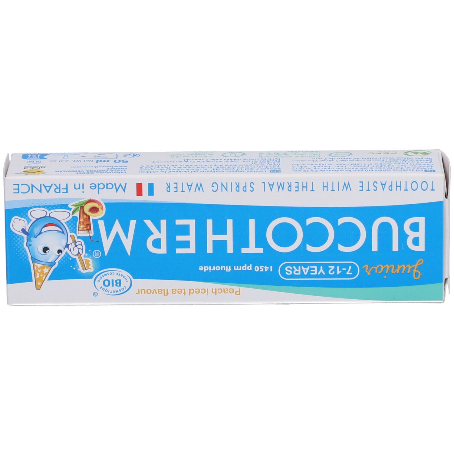Boîte avec BUCCOTHERM Junior, 7-12 ans. Inscription: Dentifrice à l'eau thermale, goût thé glacé pêche.