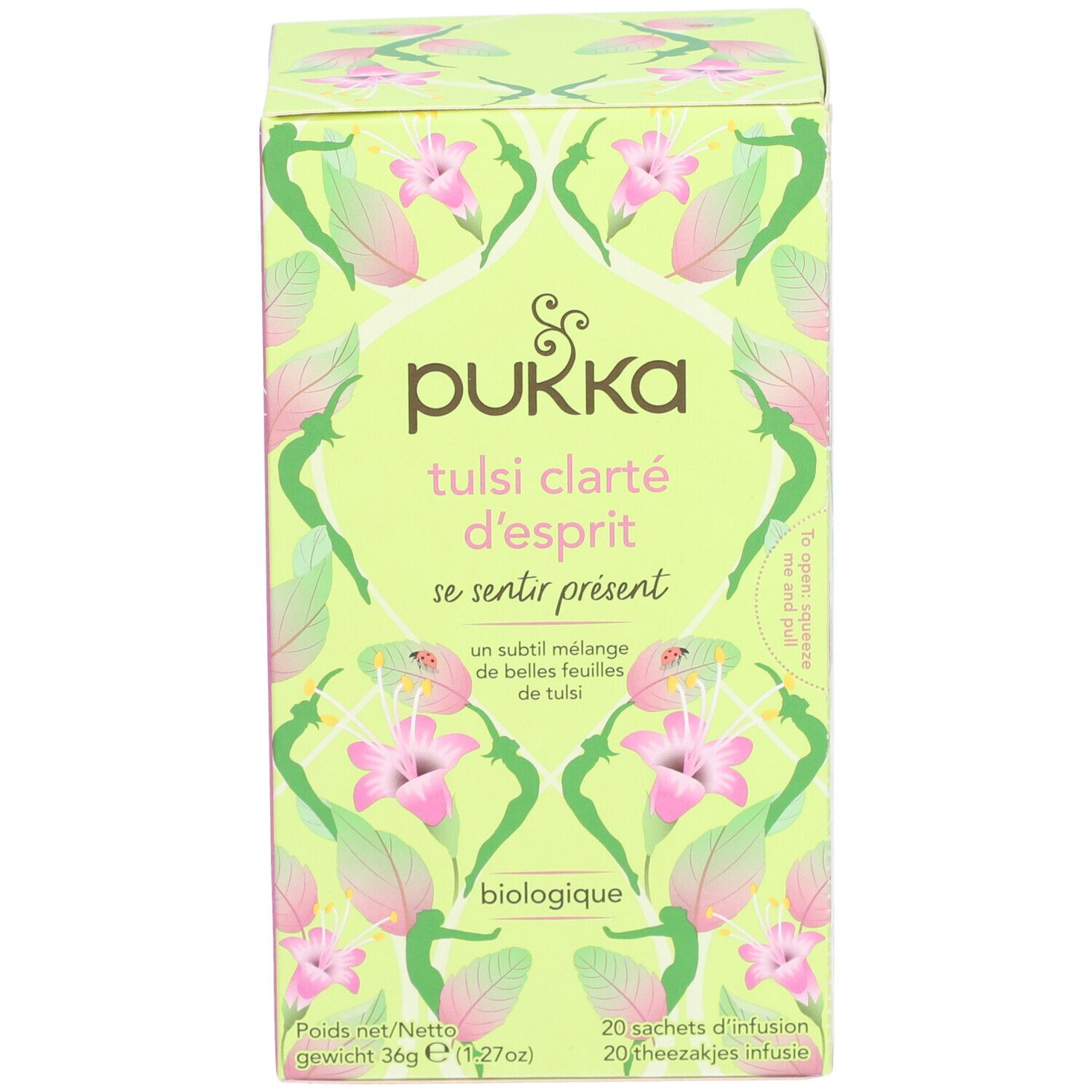 Boîte de thé Pukka Tulsi Clarté d'esprit. Design vert et rose avec motifs floraux. Contient 20 sachets. Certification bio.