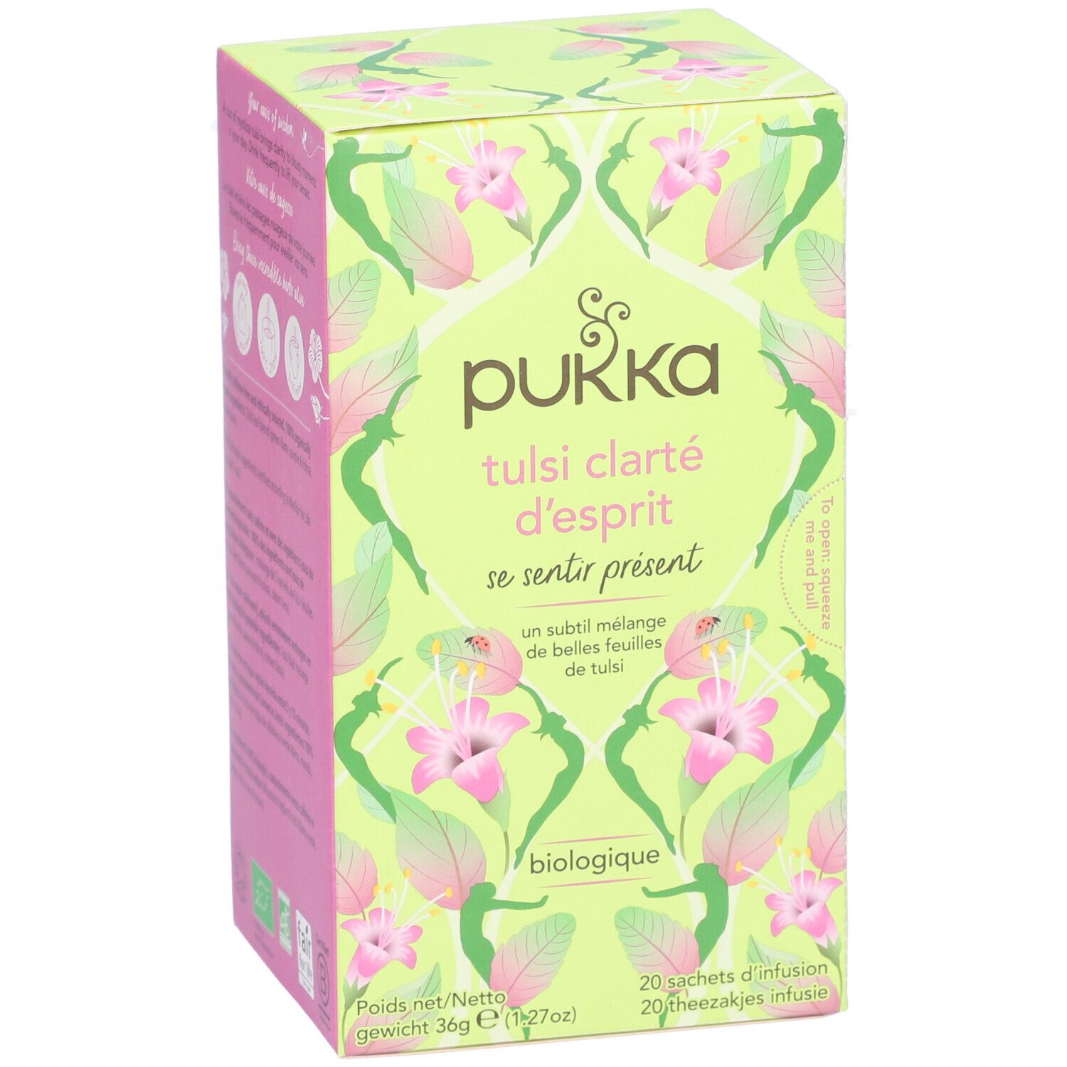 Boîte de thé Pukka Tulsi Clarté d'esprit. Design vert et rose avec motifs floraux. Contient 20 sachets. Certification bio.