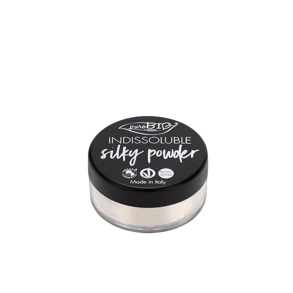 Runde, schwarze Dose mit weißem Puder. Deckel mit Schriftzug: Indissoluble silky powder. Mit Siegeln und Aufschrift: Made in Italy.