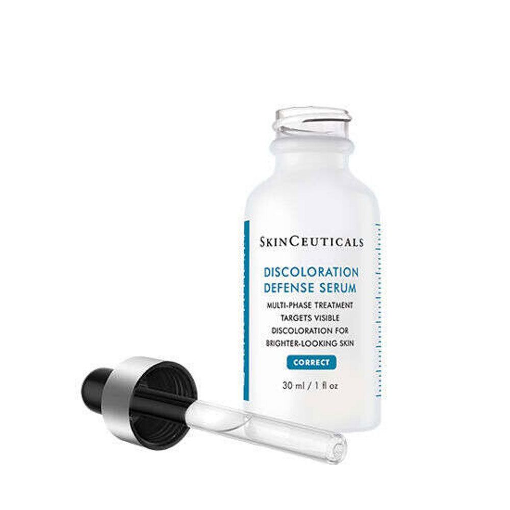 Flacon blanc avec compte-gouttes noir. SkinCeuticals Discoloration Defense Serum. Compte-gouttes à côté.