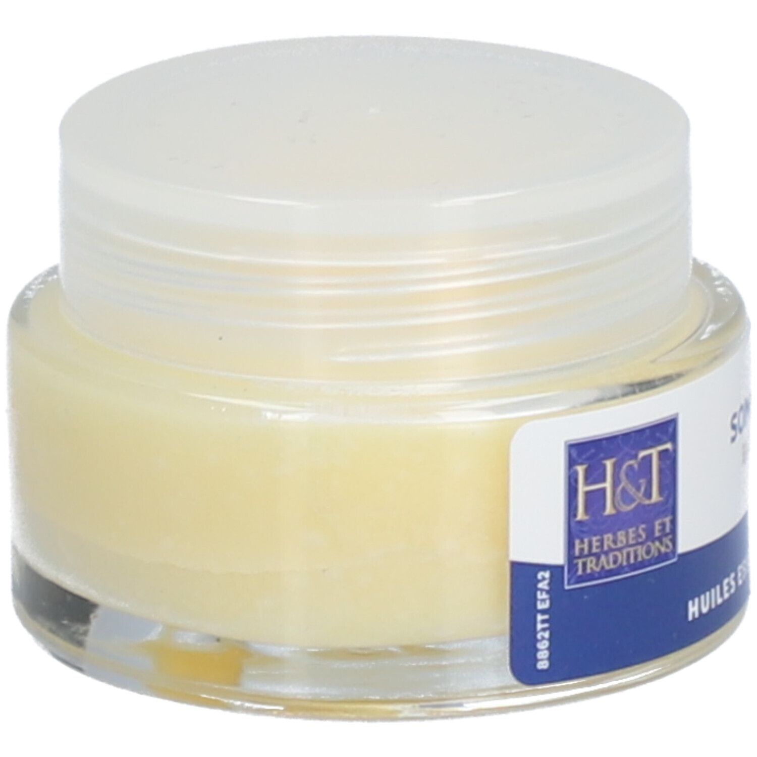 Pot en verre avec couvercle blanc. Crème jaune visible. Étiquette: H&T, SOMMEIL BAUME.