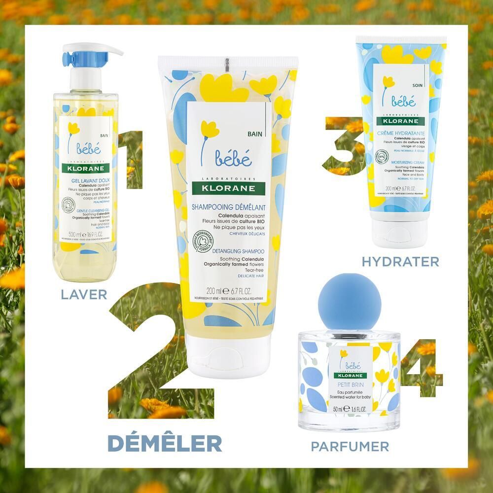 Produktabbildung mit 4 Produkten: Shampoo, Spülung, Creme und Parfum. Hintergrund mit Blüten.