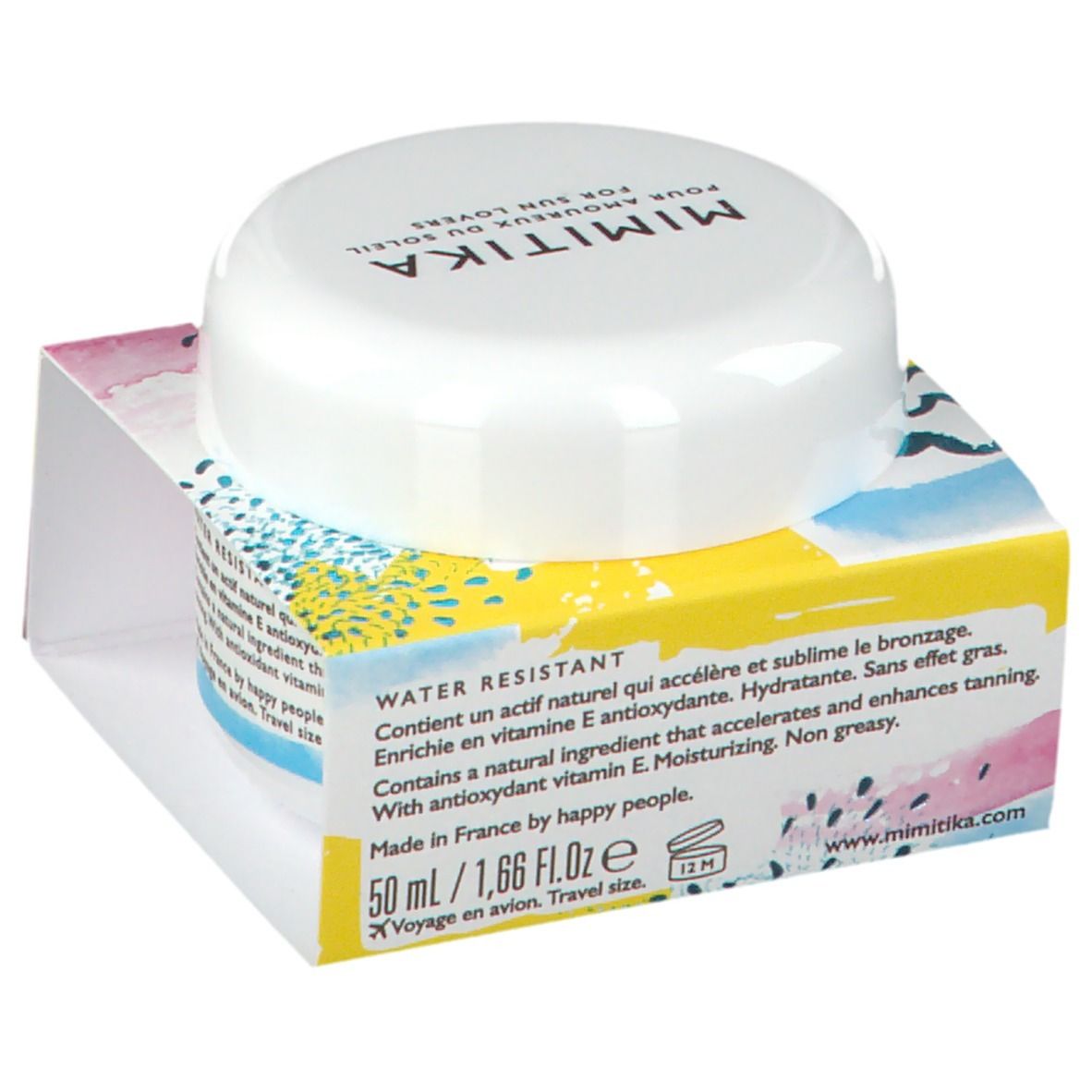 Pot blanc avec couvercle sur boîte imprimée. Sur le pot, "MIMITIKA". Sur la boîte : "50 ml / 1,66 Fl.oz".