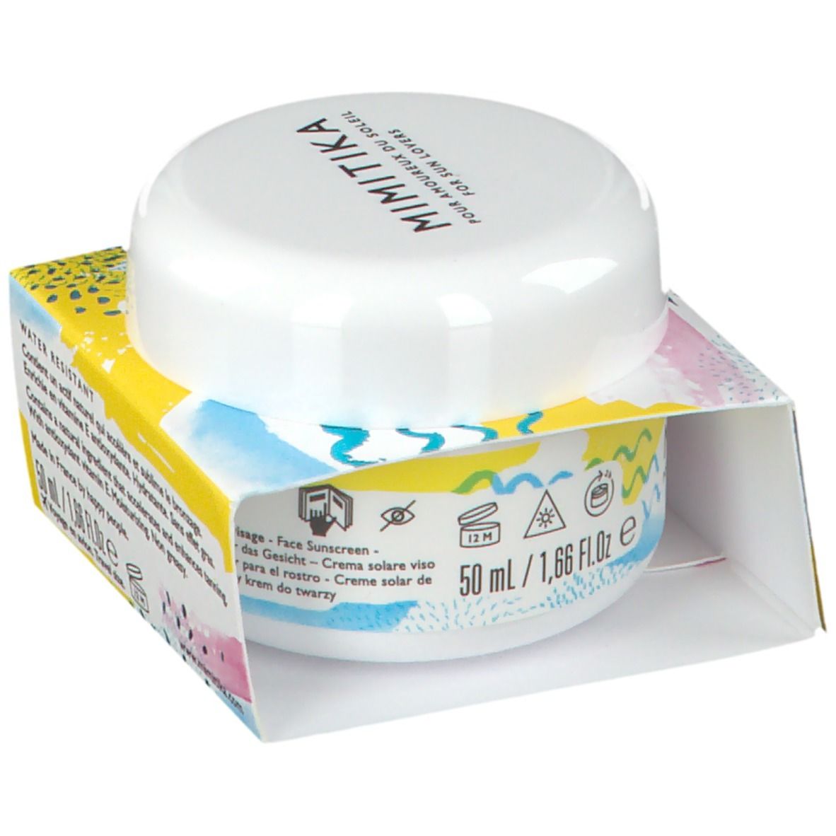 Pot blanc avec couvercle sur boîte imprimée. Sur le pot, "MIMITIKA". Sur la boîte : "50 ml / 1,66 Fl.oz".