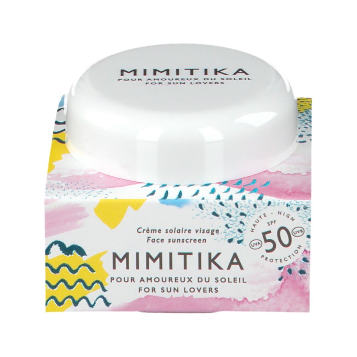 Pot blanc avec couvercle sur boîte imprimée. Sur le couvercle, "MIMITIKA". Sur la boîte : "Crème solaire visage".