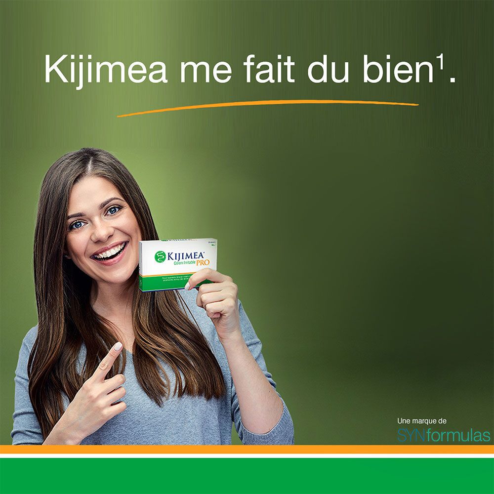 Femme tenant un paquet de KIJIMEA® Côlon Irritable PRO. Elle sourit et pointe le paquet.