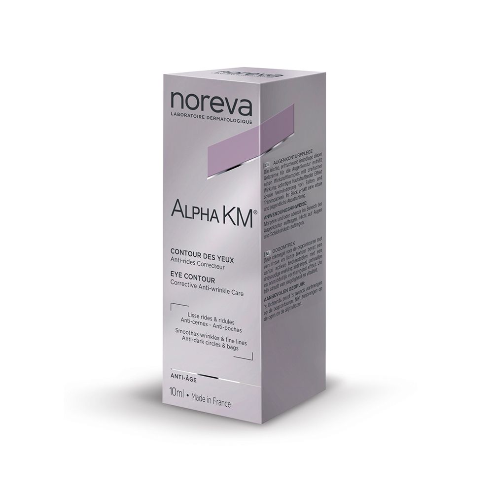 Grauer Karton. Aufschrift: Noreva, Alpha KM, Eye Contour. Enthält eine Tube. Lila Akzent.
