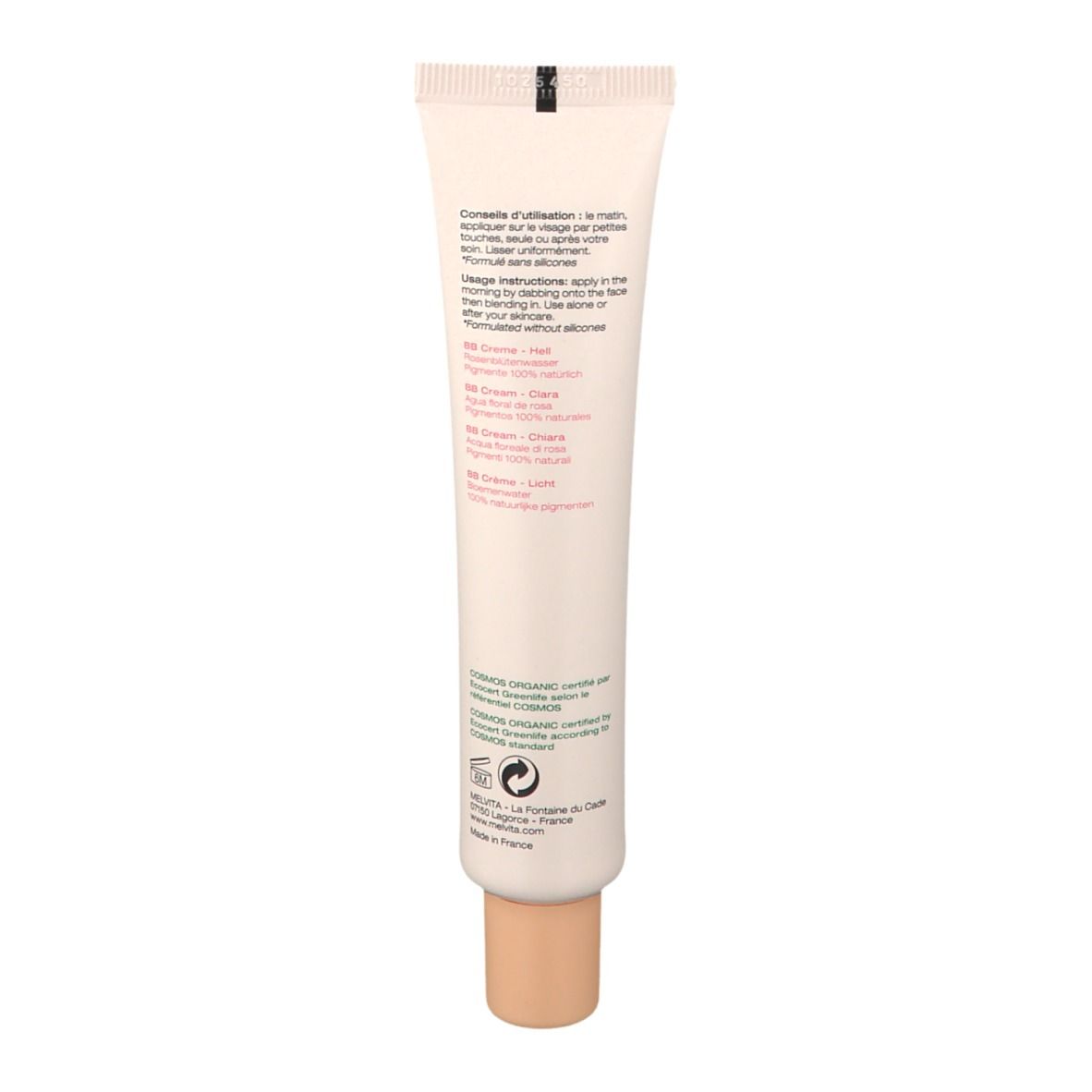 Dos du tube de crème. Texte avec instructions d'utilisation et ingrédients. Certification bio.