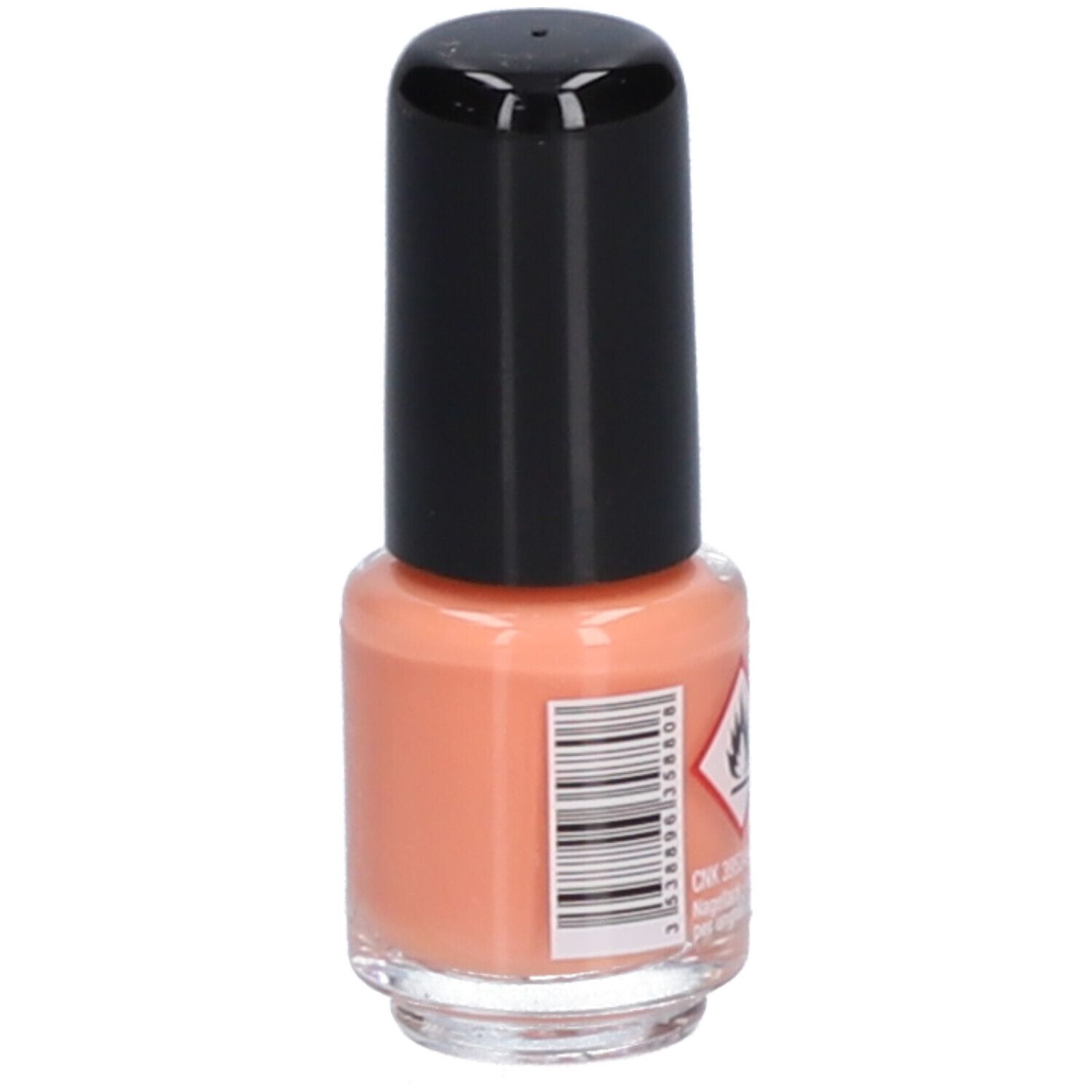 Rückseite der Nagellackflasche. Barcode, Warnhinweis. Pfirsichfarbener Lack.
