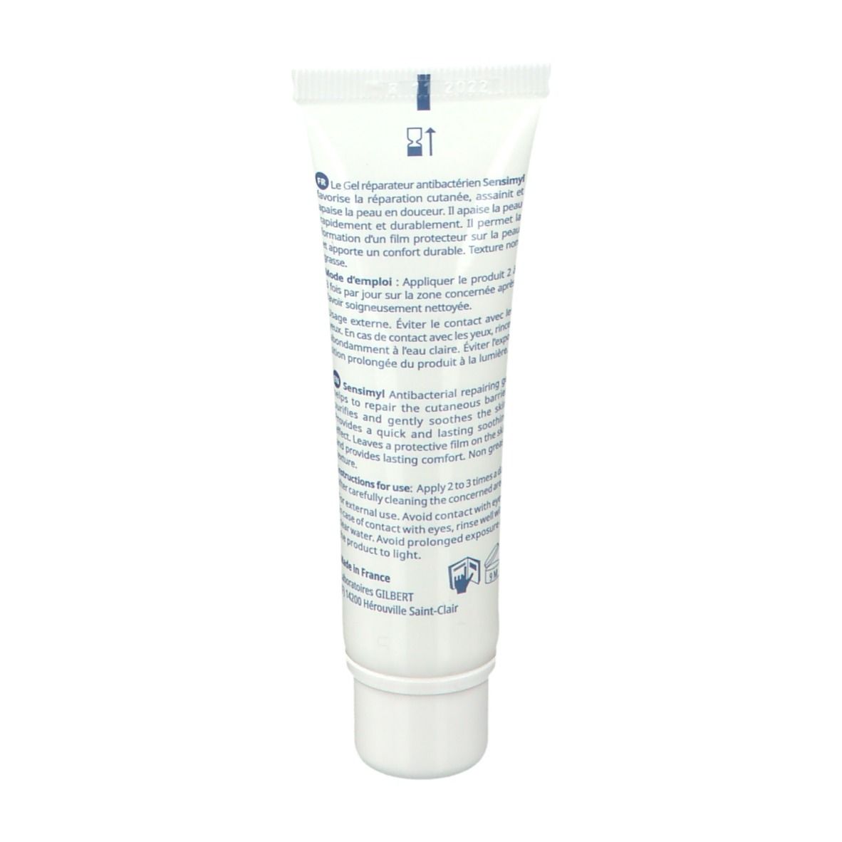 Rückseite der Tube. Text in Französisch und Englisch. Anweisungen und Inhaltsstoffe.