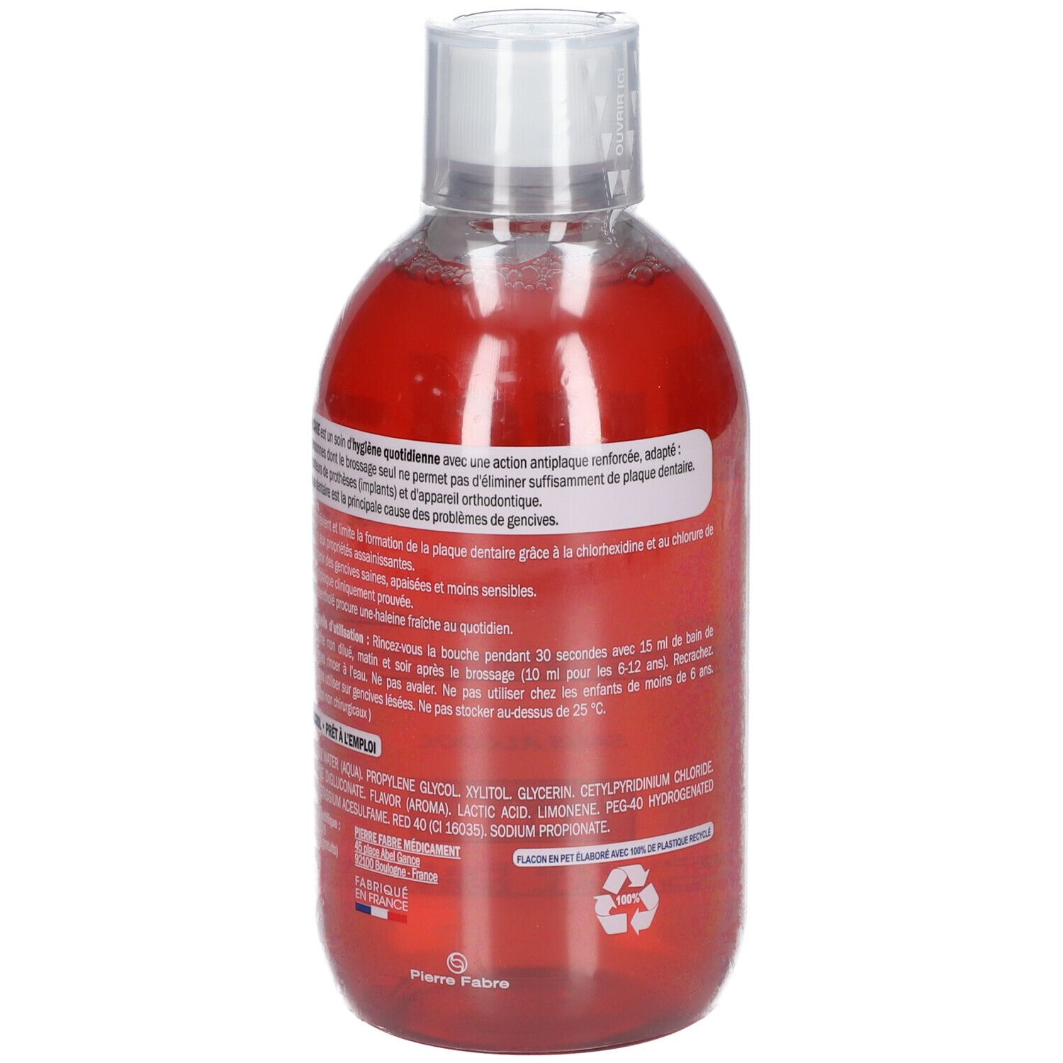 Flacon de bain de bouche rouge, dos. Informations textuelles, ingrédients et symbole de recyclage. Bouchon transparent.