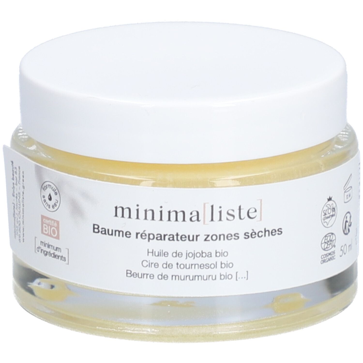 Pot en verre avec couvercle blanc. Inscription : minimaliste, Baume réparateur zones sèches. Contient huile de jojoba, cire de tournesol, beurre de murumuru.