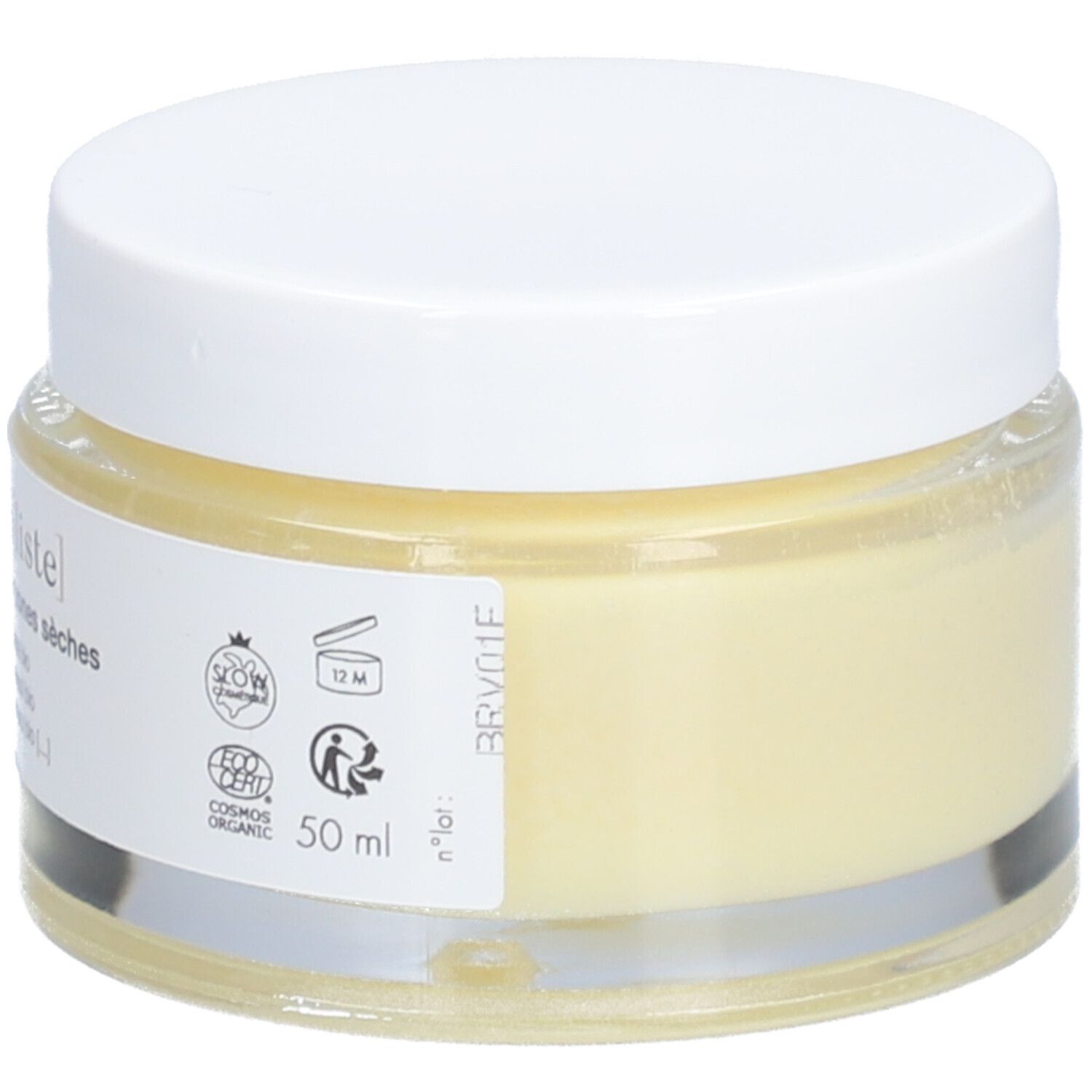 Pot en verre avec couvercle blanc. Inscription : minimaliste, Baume réparateur zones sèches. Contient huile de jojoba, cire de tournesol, beurre de murumuru.