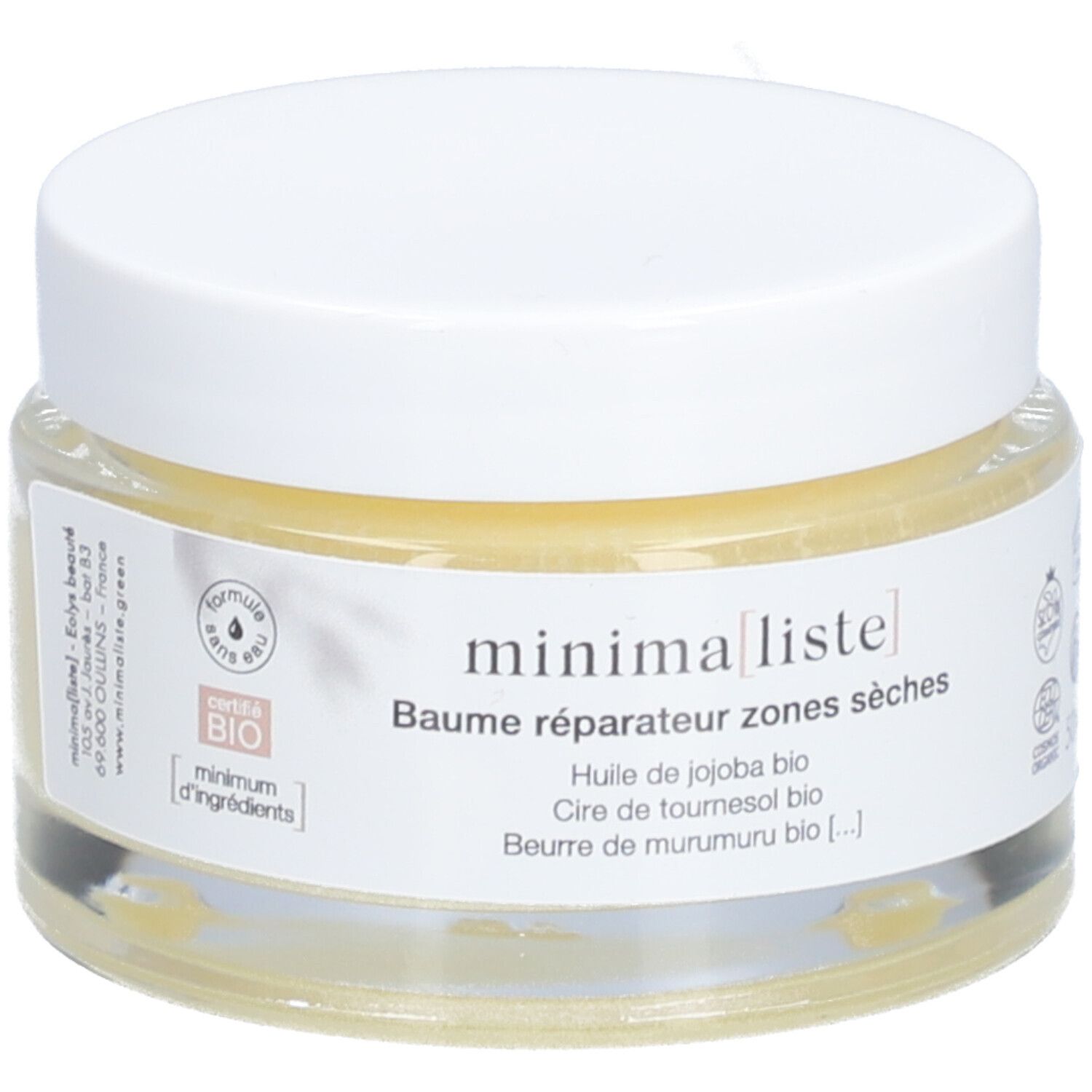 Pot en verre avec couvercle blanc. Inscription : minimaliste, Baume réparateur zones sèches. Contient huile de jojoba, cire de tournesol, beurre de murumuru.