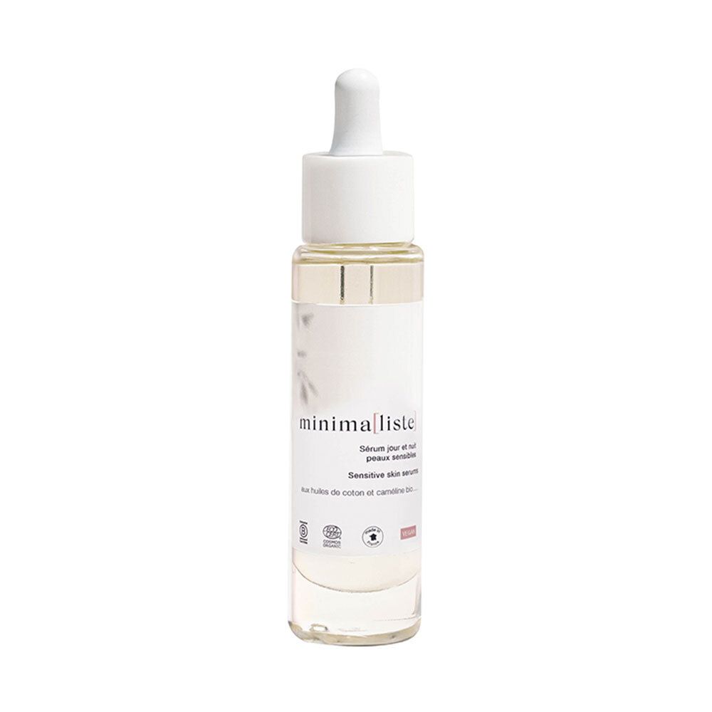 Sérum clair en flacon de verre avec pipette. Inscription : minimaliste. Pour peaux sensibles.