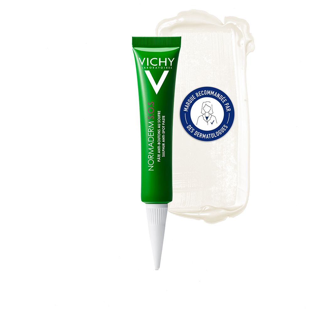 Tube vert avec embout blanc. Inscription : VICHY NORMADERM S.O.S. Pâte anti-boutons au soufre. Testé dermatologiquement.